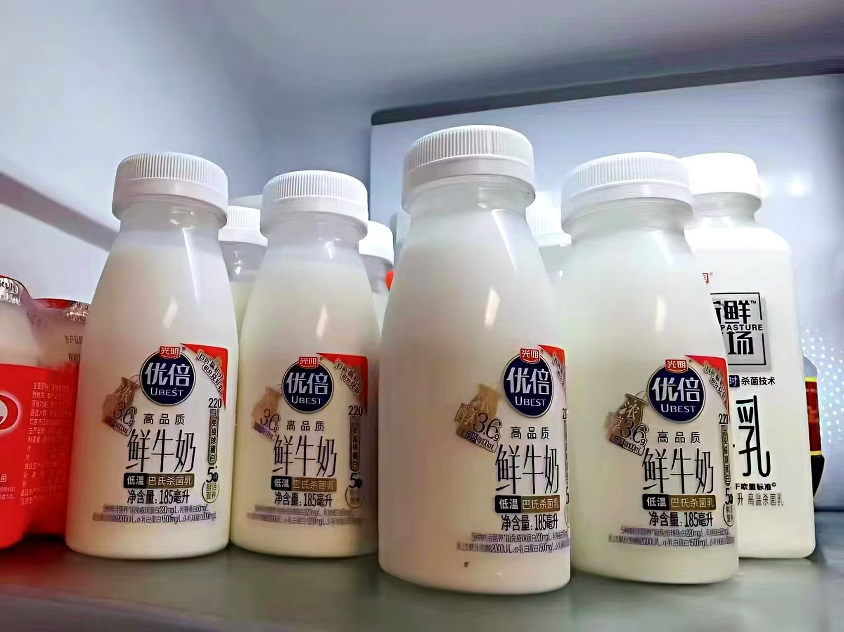 光明优倍鲜奶185ml*10瓶+205ml*2瓶 33元 - 86线报