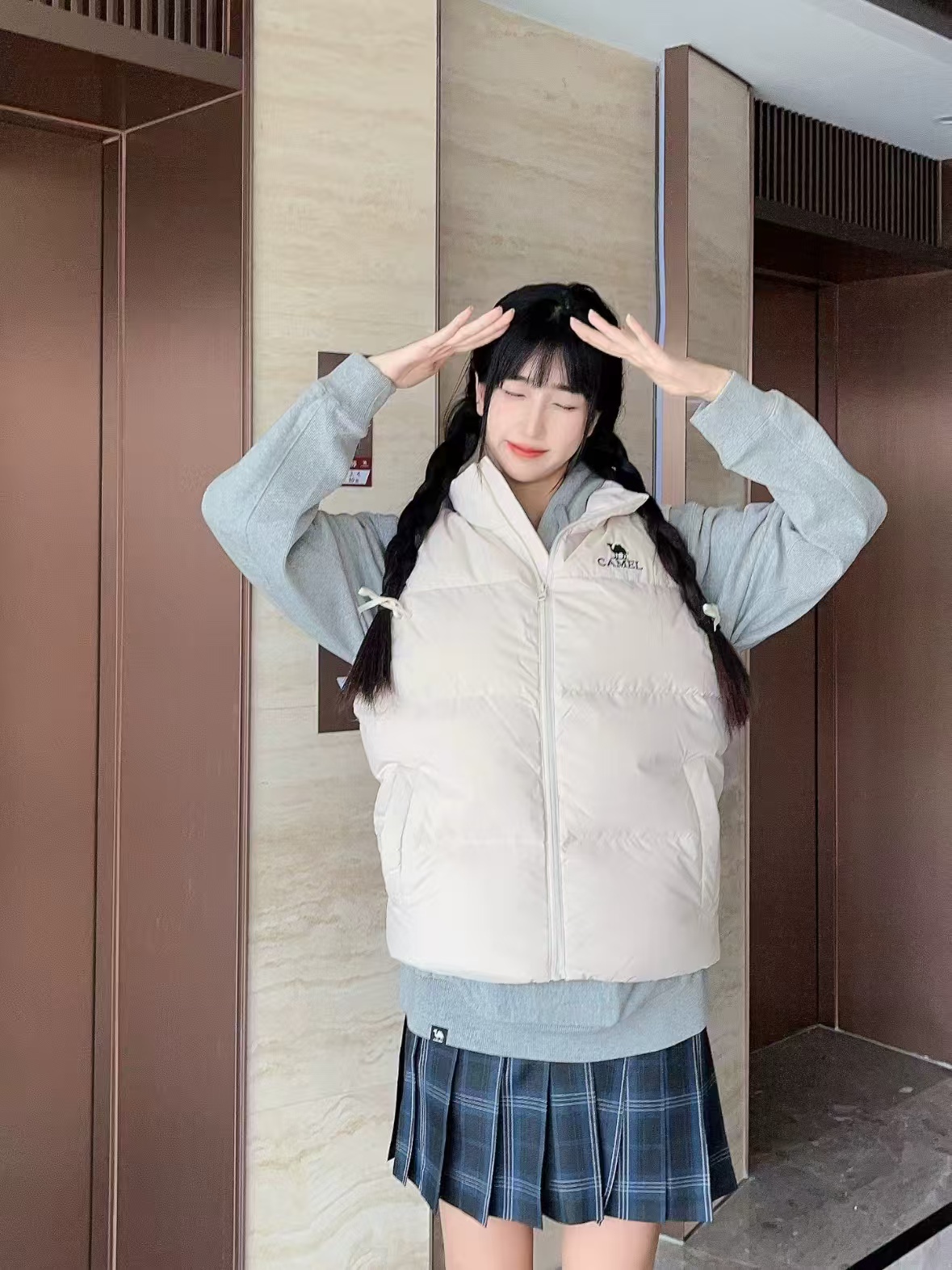 骆驼羽绒马甲立领短款男白鸭绒保暖休闲背心女 189元 - 线报酷